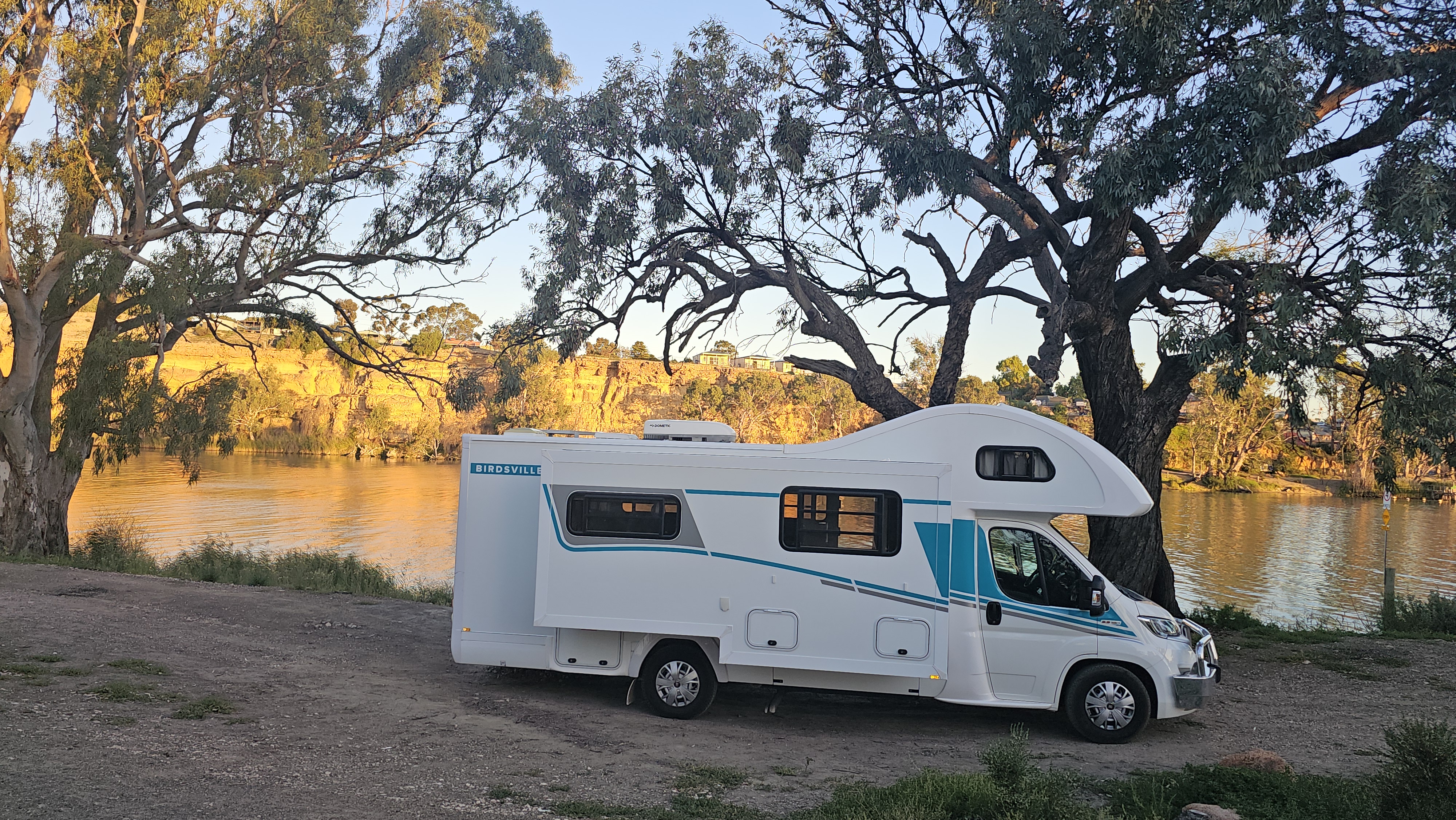 Izzy parked at sunset