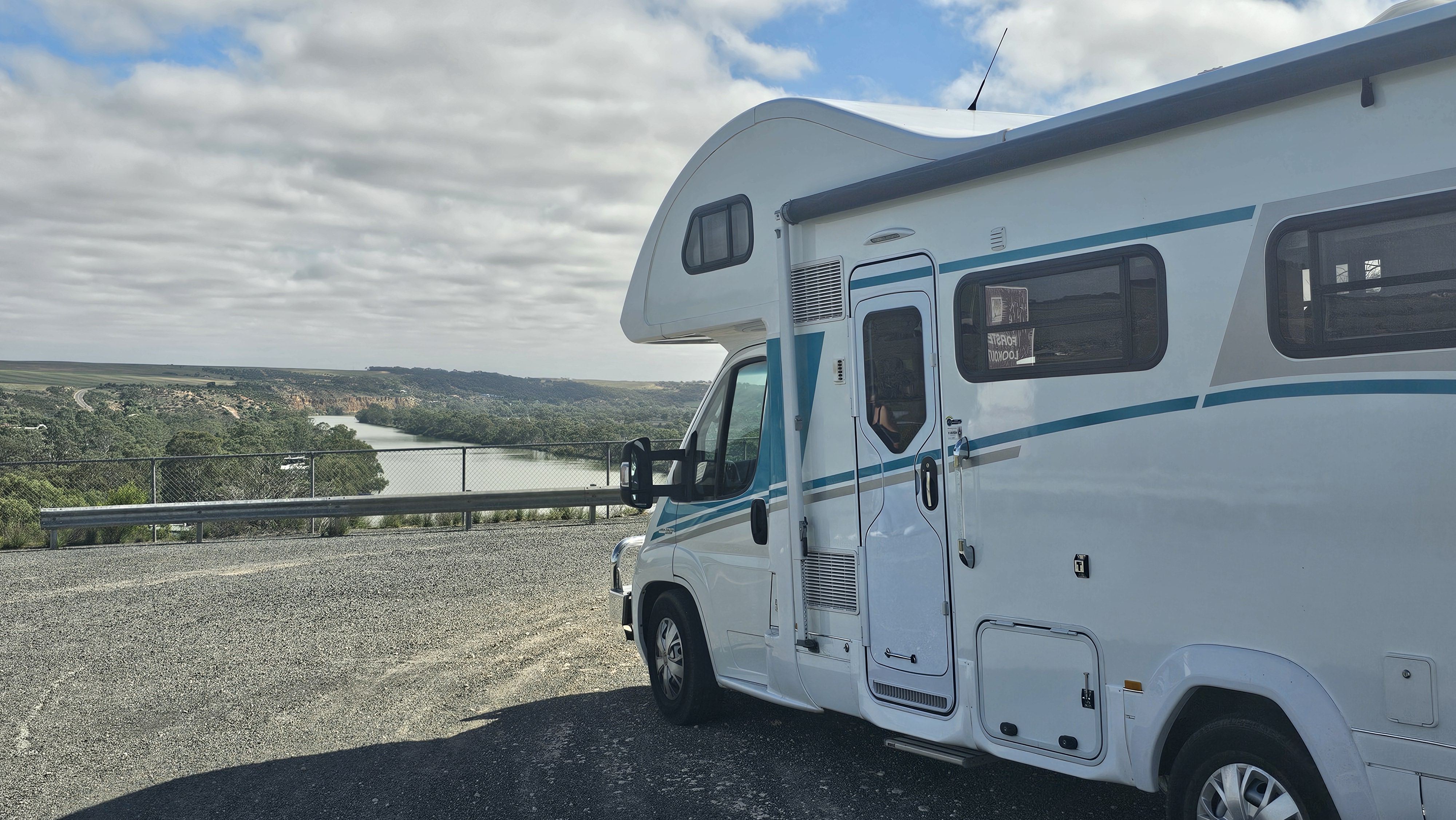 Izzy parked above a river valley